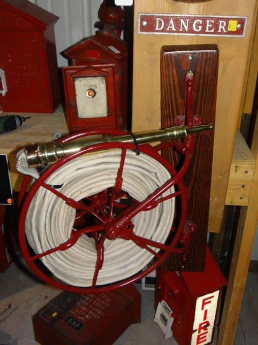 VINTAGE FIRE HOSE REEL And HOSE.